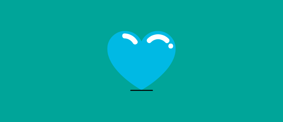 Blue love heart on a green background