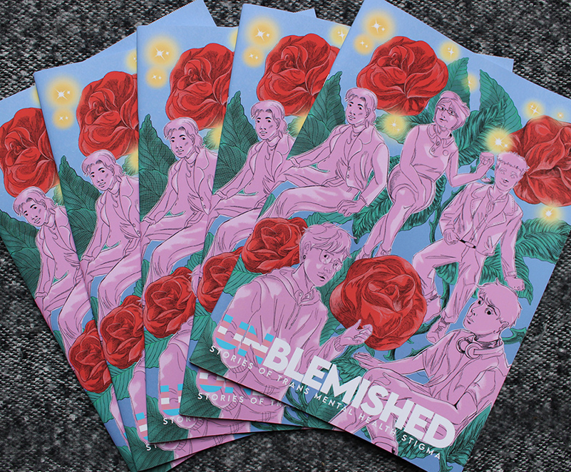 Fanned out copies of Unblemished.