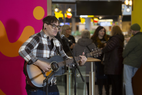 Image is of Chris Grant performing.