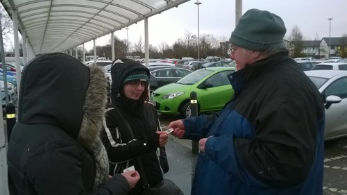 Richard handing  out badges