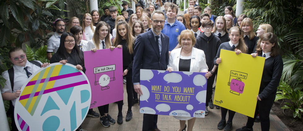 See Me volunteers, staff, the Scottish Government's mental health minister and pupils from Leith Academy