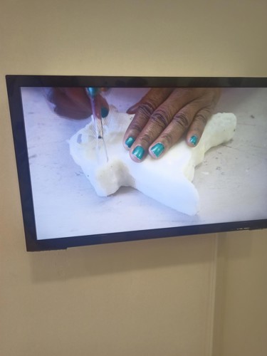 Video of someone carving a soap sculpture.